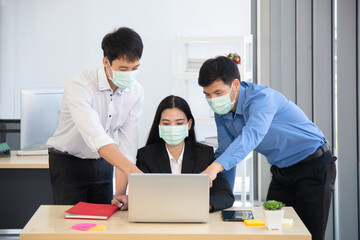 employee wear surgical mask before talking together