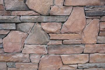 Sandstone rock stone wall background.