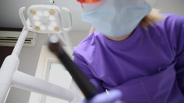 Dental examinations, the orthodontist check your teeth and braces at the cli