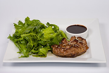 natural cutlet with arugula leaves