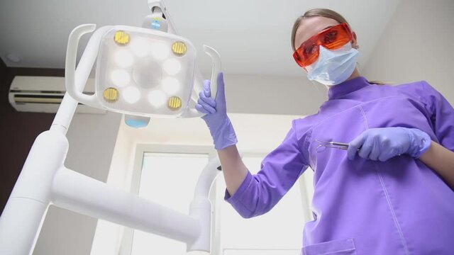 Dental examinations, the orthodontist check your teeth and braces at the cli