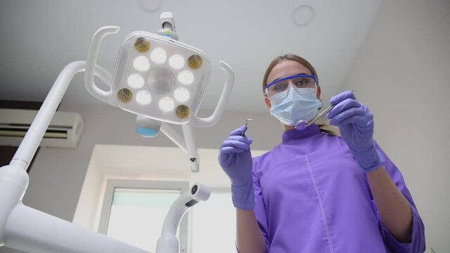 Dental examinations, the orthodontist check your teeth and braces at the cli