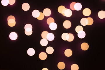 Bokeh background. Colored bright blurred texture of lights