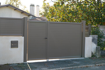 brown aluminum modern style gate home portal of suburb city house