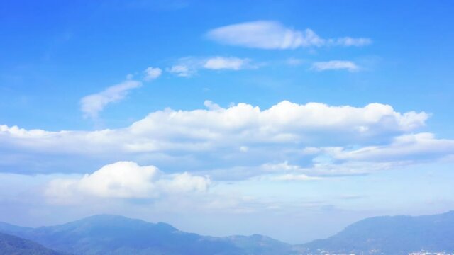 4K Areal drone view moving from town to sky. Summer blue sky with cloud moving pan camera.