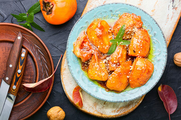 Appetizing caramelized persimmon.