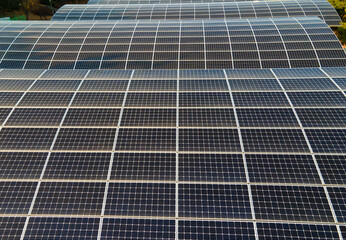 Black solar panels close-up, renewable energy concept.