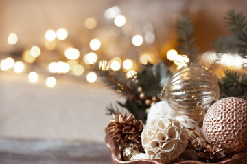 Christmas background with decorations on a Christmas tree on a blurred background copy space.