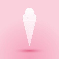 Paper cut Ice cream in waffle cone icon isolated on pink background. Paper art style. Vector.