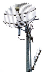 Metal telecom tower and antennas isolated on white