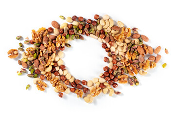 Nuts. Many different nuts forming a frame for copy space, shot from the top on a white background