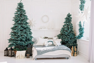 Festive interior. Luxurious Christmas tree decorated with lights with gifts. Happy New Year 2021. Christmas concept. Soft selective focus. Copy space.