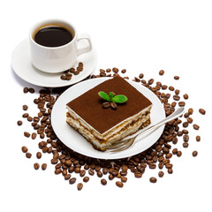 Traditional Italian Tiramisu dessert square portion on ceramic plate and cup of fresh espresso coffee isolated on white