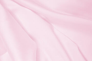 Smooth elegant pink silk or satin texture as wedding background. Luxurious background design