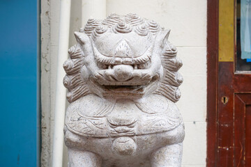 A guardian lion statue in London Chinatown