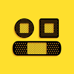 Black Set Bandage plaster icon isolated on yellow background. Medical plaster, adhesive bandage, flexible fabric bandage. Long shadow style. Vector.