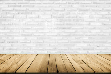 Empty wooden table top on white brick wall background, Design wood terrace white. Perspective for show space for your copy and branding. Can be used as product display montage. Vintage style concept.