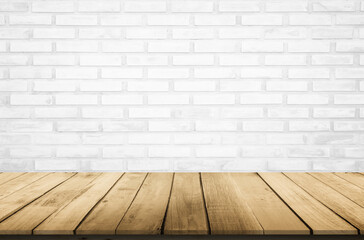 Empty wooden table top on white brick wall background, Design wood terrace white. Perspective for show space for your copy and branding. Can be used as product display montage. Vintage style concept.