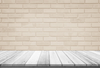 Empty wooden table top on cream brick wall background, Design wood terrace white. Perspective for show space for your copy and branding. Can be used as product display montage. Vintage style concept.