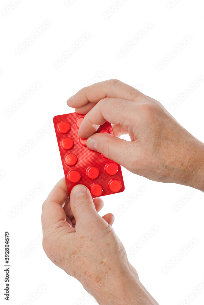 Poster hand of old man with pills