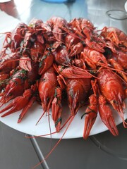 
Boiled crayfish on a white dish