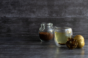 Buckwheat tea in a transparent glass in a new year's atmosphere.