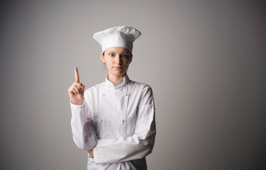 Chef woman. Isolated on gray background