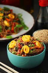 Japchae, a sweet and savory dish of stir-fried glass noodles, Korean cuisine
