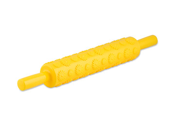 Yellow silicone rolling pin with flowers isolated on white background, copy space.