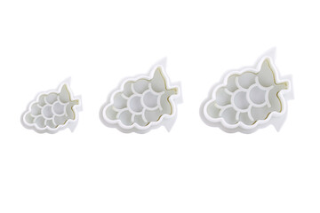 Plastic cutter for mastic isolated on white background. Mold, bakeware. Top view, flat lay