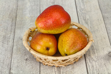 Pear heap in the wooden basket