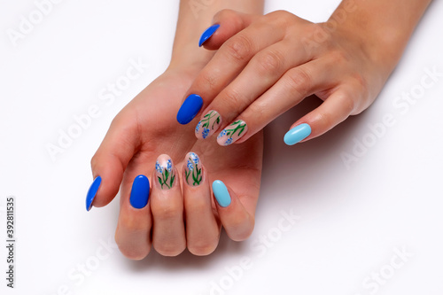 Dark Blue Light Blue Manicure With Painted Summer Flowers On Oval Long Nails Close Up On A White Background Wall Mural Dina Shuba Dark Blue Light Blue Manicure With Painted Summer Flowers On Oval Long Nails Close Up On A White Background Wall Mural Dina Shuba