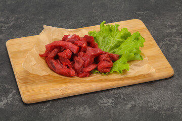 Raw beef meat sliced for cooking