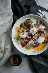 Jerky beef with caramelized beets. A dish for a restaurant. Dark tones