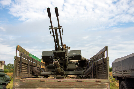 Double-barreled anti-aircraft gun in the back of the car