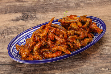 Canned anchovy in tomato sauce