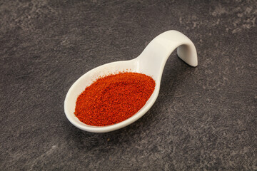 Dry paprika powder in the bowl