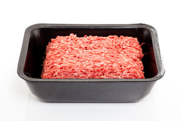 A black plastic tray of ground beef isolated on white background.