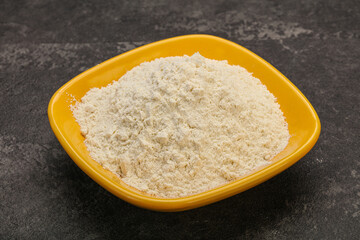 Wheat flour heap in the bowl