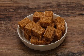 Cane sugar cubs in the bowl