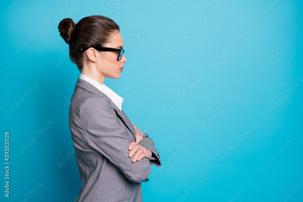 Sticker Profile side view portrait of attractive serious smart clever lady folded arms copy space isolated over bright blue color background