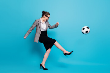 Full length profile side photo funky boss woman kick ball scream wear blazer skirt isolated blue...