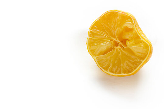 squeezed lemon on a white background