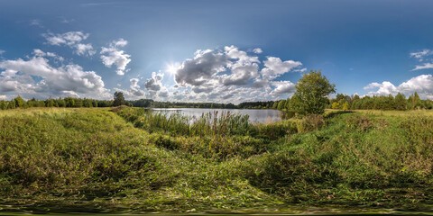 Fototapeta na wymiar full seamless spherical hdri panorama 360 degrees angle view embankment of wide river in sunny day with beautiful clouds in equirectangular projection, ready VR AR virtual reality content