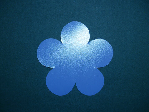 A Delicate Silver Flower With A Blue Tint On A Blue Background. DIY Paper Crafts.