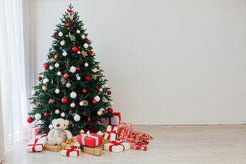 New Year's background Christmas tree with gifts interer decor
