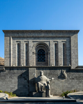 Mesrop Mashtots Institute of Ancient Manuscripts, called Matenadaran and statues of Mesrop Mashtots and his disciple Koryun in the foreground, 