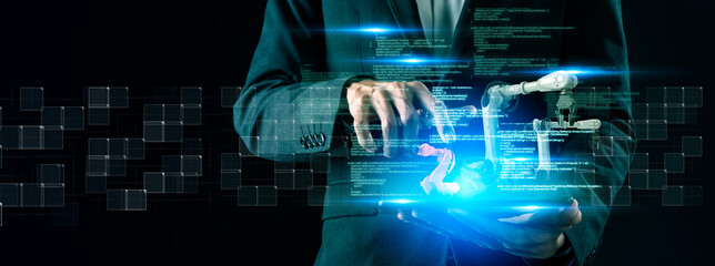 Man and augmented reality innovation technology engineer robot arm with artificial intelligence controlling futuristic smart factory digital technology. Business man in suit hand holding robot