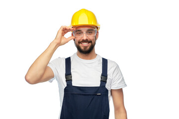 profession, construction and building - happy smiling male worker or builder in yellow helmet and overall over white background