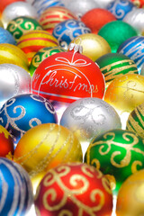 Christmas decoration with group of colourful baubles